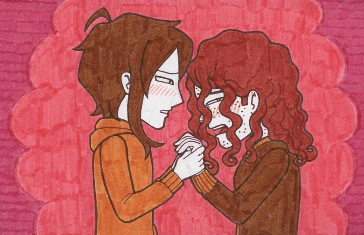 Ximun holding Rowan's hands as she cries.